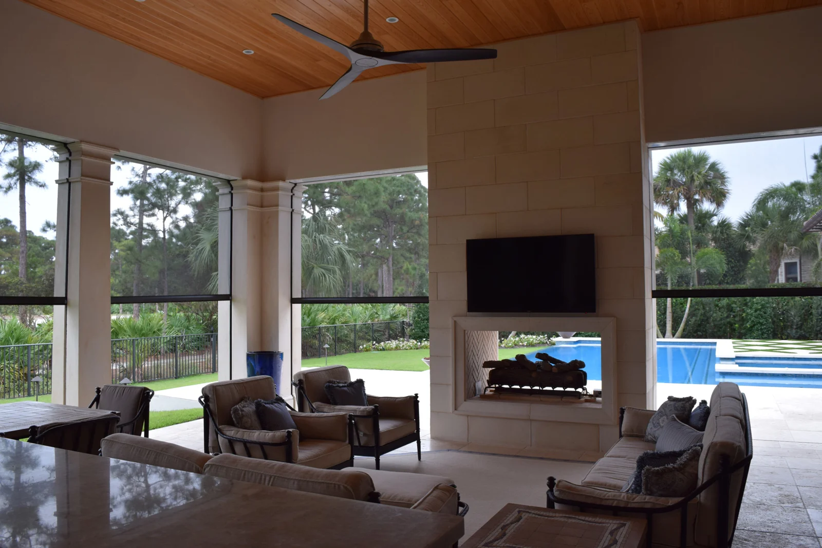 Fenetex insect screens surrounding a covered outdoor living room